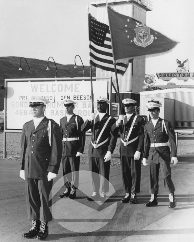 1965 photo of welcome sign at Sondrestrom Air Base, 1965 on the occasion of a visit from Danish Prince Knud.